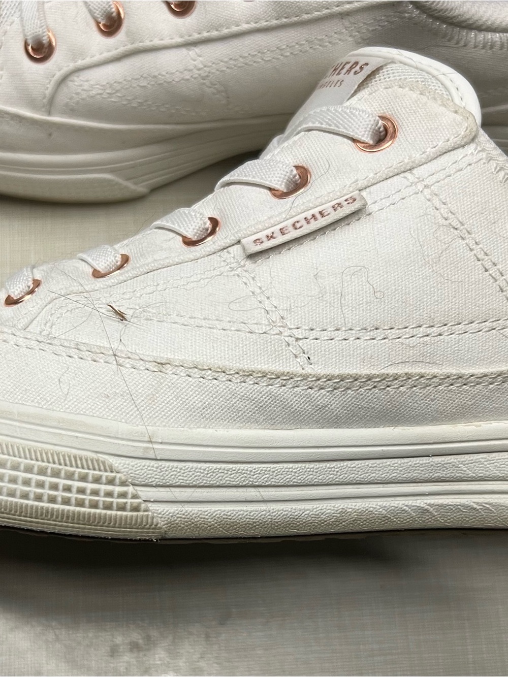 Skechers Women’s White Sneakers with Rose Gold Eyelets